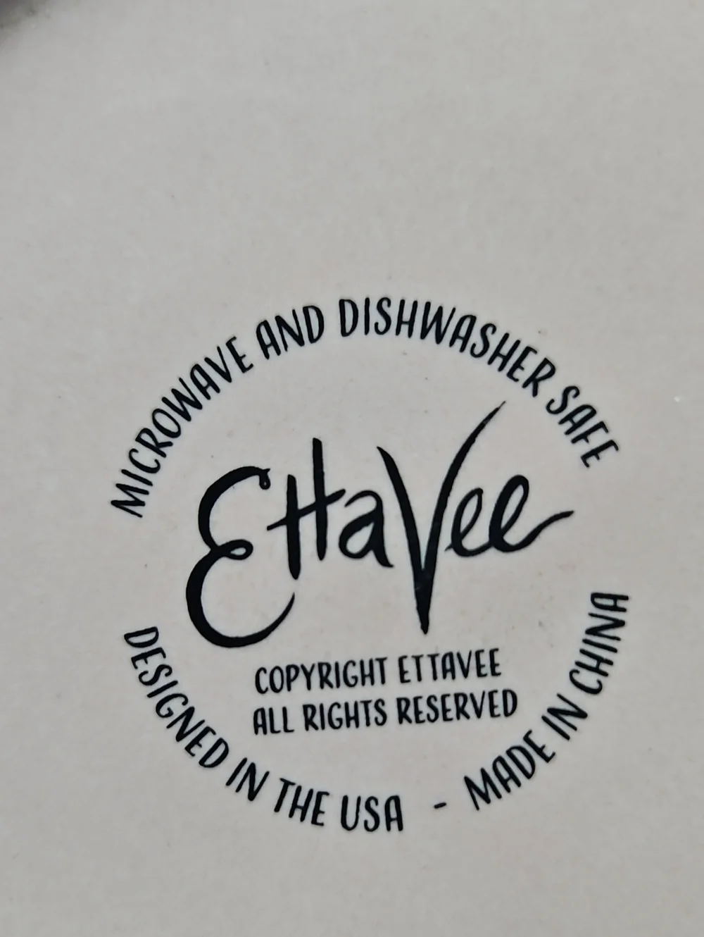 Etta Vee ceramic mug features a 